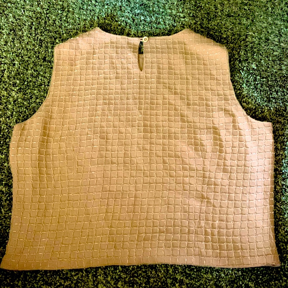 Light peach and cream sequence top. Dry clean only. 28% Rayon